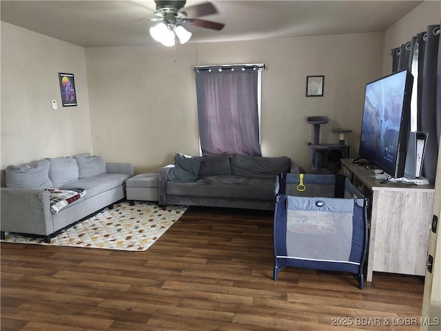 203 3rd St, Stover, MO 65078 - living room with wood finished floors and a ceiling fan
