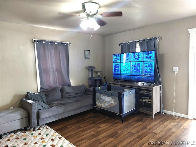203 3rd St, Stover, MO 65078 - living area with wood finished floors and ceiling fan