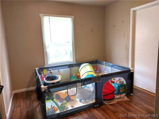 203 3rd St, Stover, MO 65078 - recreation room featuring wood finished floors and baseboards