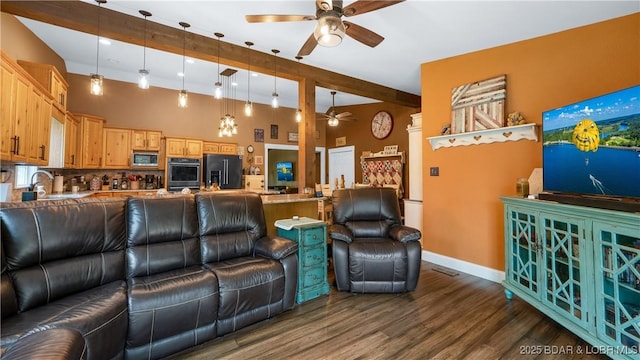 660 Upper Prairie Hollow Rd, Macks Creek, MO 65786 - living area with a ceiling fan, dark wood finished floors, a high ceiling, and baseboards
