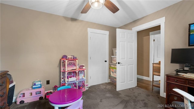 660 Upper Prairie Hollow Rd, Macks Creek, MO 65786 - recreation room featuring ceiling fan and dark carpet