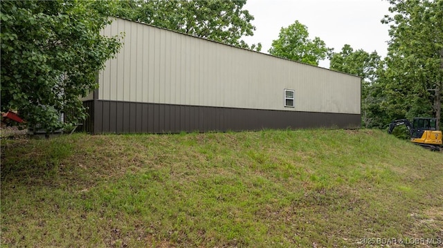 660 Upper Prairie Hollow Rd, Macks Creek, MO 65786 - view of side of home with a yard and an outbuilding