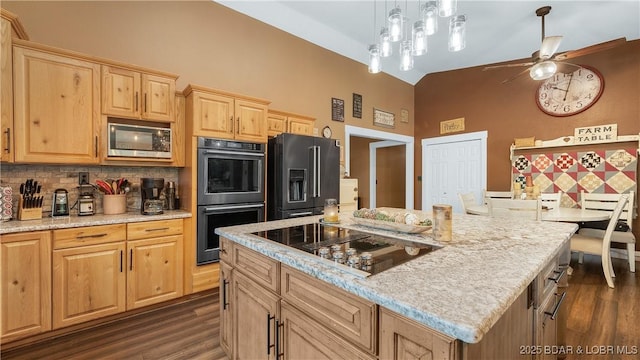 660 Upper Prairie Hollow Rd, Macks Creek, MO 65786 - kitchen featuring multiple ovens, stainless steel microwave, high quality fridge, high vaulted ceiling, and dark wood-type flooring