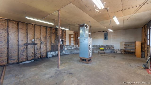 864 Four Waters Dr, Sunrise Beach, MO 65079 - garage featuring electric panel and heating unit