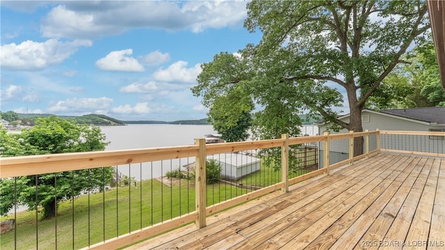 864 Four Waters Dr, Sunrise Beach, MO 65079 - wooden deck featuring a water view and a yard