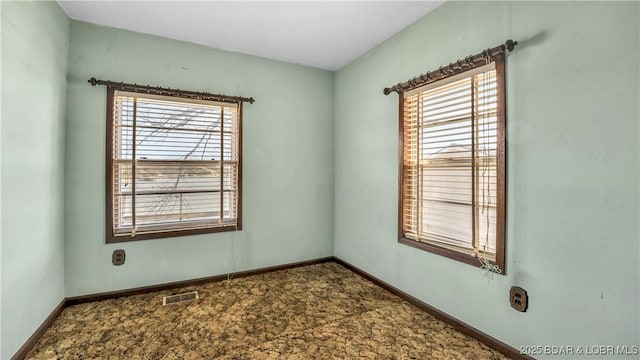 864 Four Waters Dr, Sunrise Beach, MO 65079 - unfurnished room featuring carpet floors and baseboards
