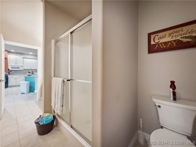 134 Heavenly Days Cir Unit 3A, Camdenton, MO 65020 - full bathroom with a shower stall, toilet, and tile patterned flooring