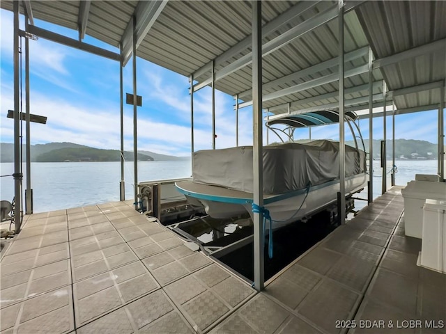 134 Heavenly Days Cir Unit 3A, Camdenton, MO 65020 - dock featuring boat lift and a water and mountain view
