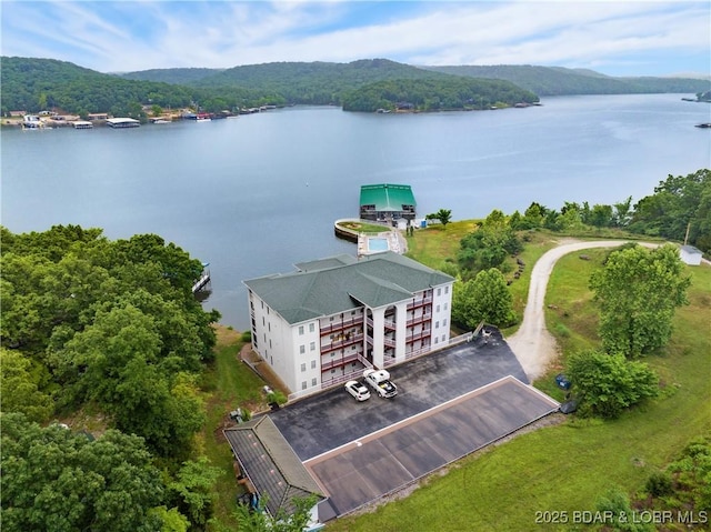 134 Heavenly Days Cir Unit 3A, Camdenton, MO 65020 - drone / aerial view of a nearby body of water and a forest