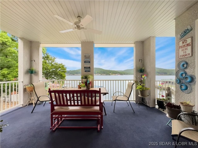 134 Heavenly Days Cir Unit 3A, Camdenton, MO 65020 - porch featuring a ceiling fan and a water view