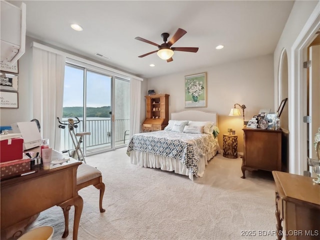 134 Heavenly Days Cir Unit 3A, Camdenton, MO 65020 - carpeted bedroom featuring access to exterior, recessed lighting, ceiling fan, an office area, and a water view