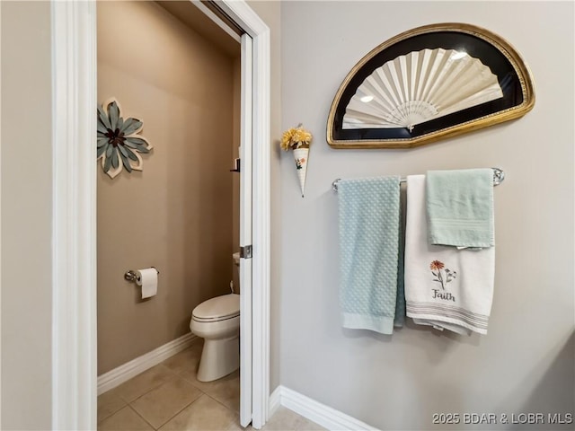134 Heavenly Days Cir Unit 3A, Camdenton, MO 65020 - bathroom featuring toilet, tile patterned floors, and baseboards