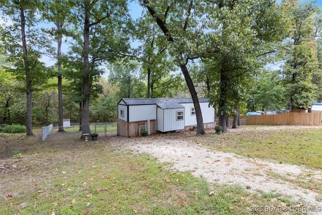 34546 Ivy Bend Rd, Stover, MO 65018 - view of yard with view of scattered trees and an outdoor structure
