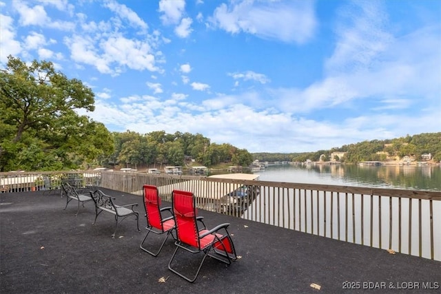 98 Jonathan Dr Unit 4C, Lake Ozark, MO 65049 - view of patio with a water view