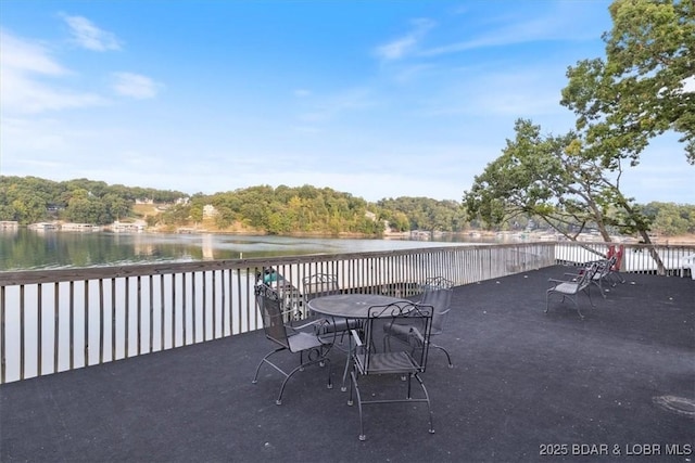 98 Jonathan Dr Unit 4C, Lake Ozark, MO 65049 - view of patio / terrace with a water view and outdoor dining area