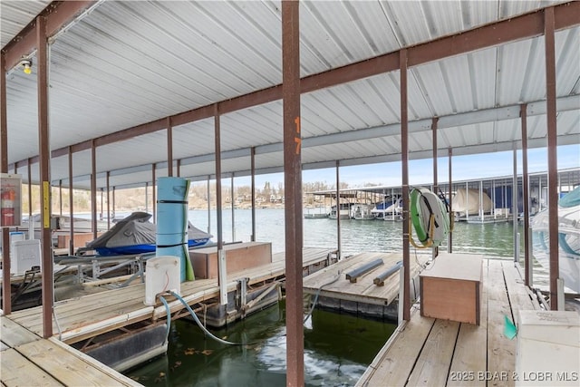 98 Jonathan Dr Unit 4C, Lake Ozark, MO 65049 - dock featuring a water view and boat lift
