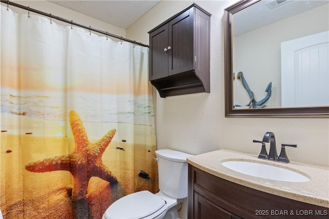 98 Jonathan Dr Unit 4C, Lake Ozark, MO 65049 - bathroom featuring toilet, vanity, and a textured ceiling