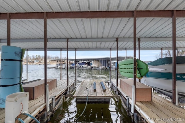 98 Jonathan Dr Unit 4C, Lake Ozark, MO 65049 - dock area with a water view and boat lift