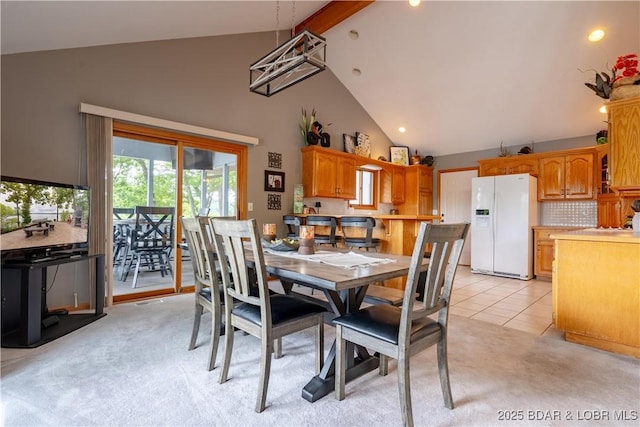 42 Rhine River Rd, Sunrise Beach, MO 65079 - dining area featuring high vaulted ceiling, light carpet, beamed ceiling, recessed lighting, and light tile patterned floors