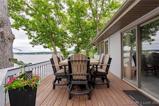 42 Rhine River Rd, Sunrise Beach, MO 65079 - wooden deck featuring outdoor dining space and a water view
