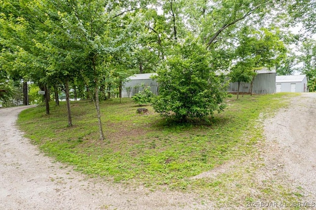 42 Rhine River Rd, Sunrise Beach, MO 65079 - view of yard featuring an outbuilding
