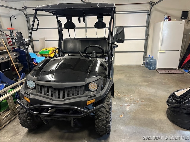 42 Rhine River Rd, Sunrise Beach, MO 65079 - garage with freestanding refrigerator