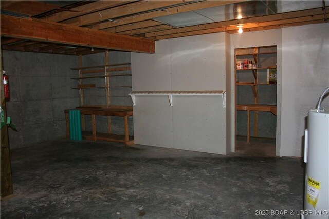 105 Birdie Dr, Gravois Mills, MO 65037 - unfinished basement featuring gas water heater