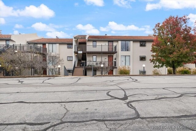 37 La Jolla Dr Unit 3C, Lake Ozark, MO 65049 - view of property with stairway