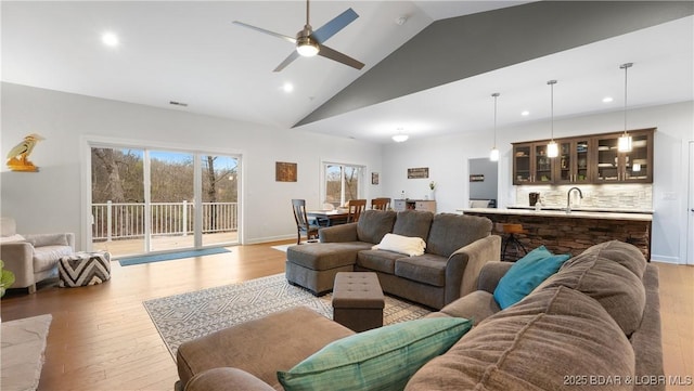 866 Fontana Ln, Linn Creek, MO 65052 - living room featuring light wood-style flooring, recessed lighting, ceiling fan, and high vaulted ceiling