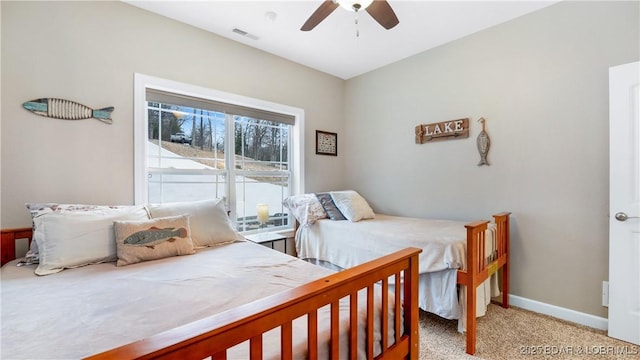 866 Fontana Ln, Linn Creek, MO 65052 - bedroom with light colored carpet, a ceiling fan, and baseboards