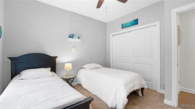 866 Fontana Ln, Linn Creek, MO 65052 - bedroom with a closet, baseboards, a ceiling fan, and carpet