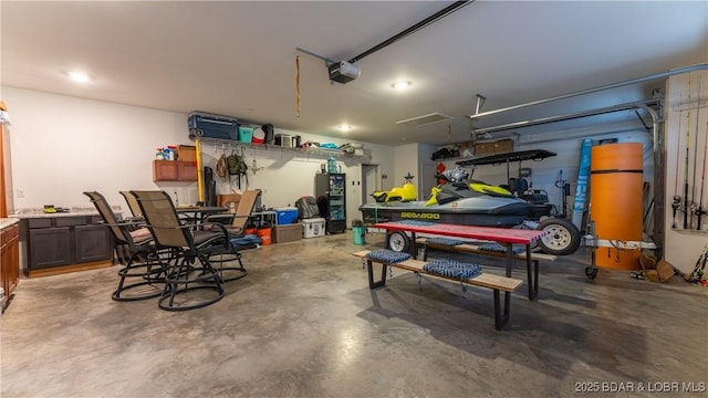 866 Fontana Ln, Linn Creek, MO 65052 - garage featuring a garage door opener
