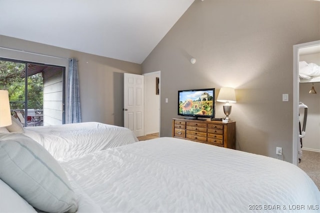 73 Ship Dock Ln, Osage Beach, MO 65065 - bedroom with vaulted ceiling, access to outside, and carpet