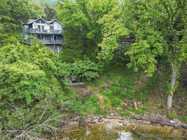 73 Ship Dock Ln, Osage Beach, MO 65065 - view of yard with a balcony