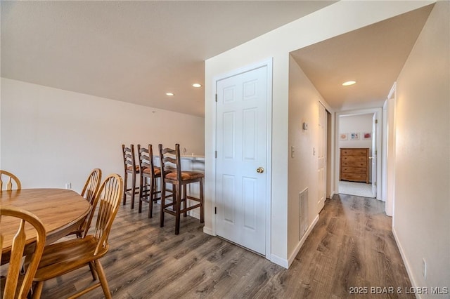 272 Cedar Glen Dr Unit 3A, Camdenton, MO 65020 - dining area with wood finished floors, baseboards, and recessed lighting