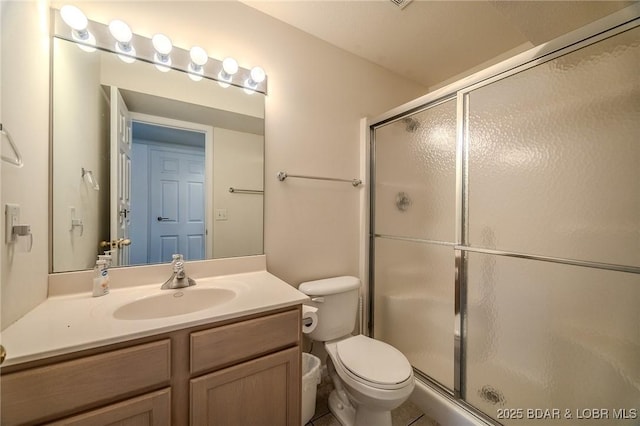 272 Cedar Glen Dr Unit 3A, Camdenton, MO 65020 - bathroom featuring vanity, a shower stall, and toilet