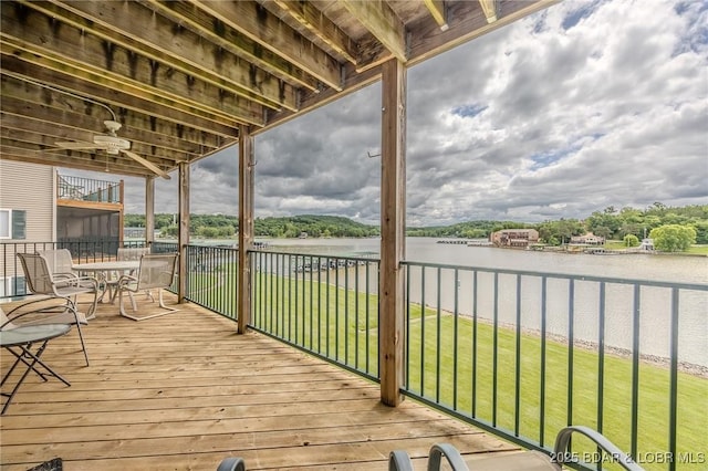 272 Cedar Glen Dr Unit 3A, Camdenton, MO 65020 - wooden terrace with a water view, a yard, and outdoor dining space