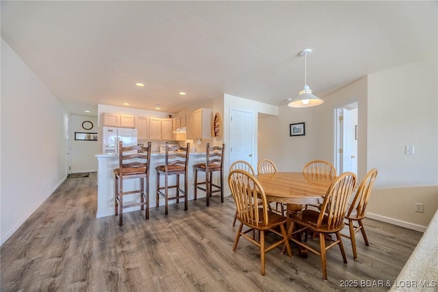 272 Cedar Glen Dr Unit 3A, Camdenton, MO 65020 - dining space featuring wood finished floors, baseboards, and recessed lighting