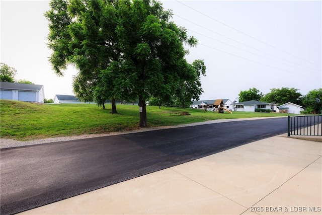 164 Park Place Ln Unit 3D, Kaiser, MO 65047 - view of asphalt street with a residential view