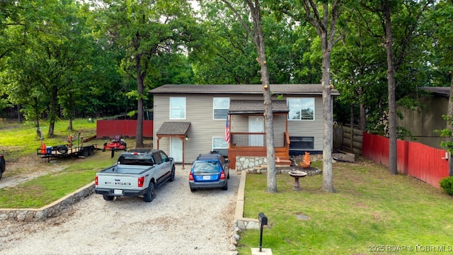 135 Tonka St, Camdenton, MO 65020 - view of front of property with roof with shingles