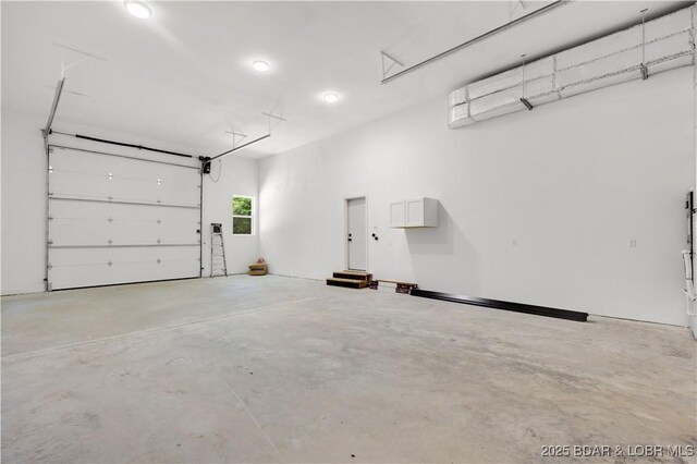 19580 Wonderland Rd, Rocky Mount, MO 65072 - garage featuring recessed lighting