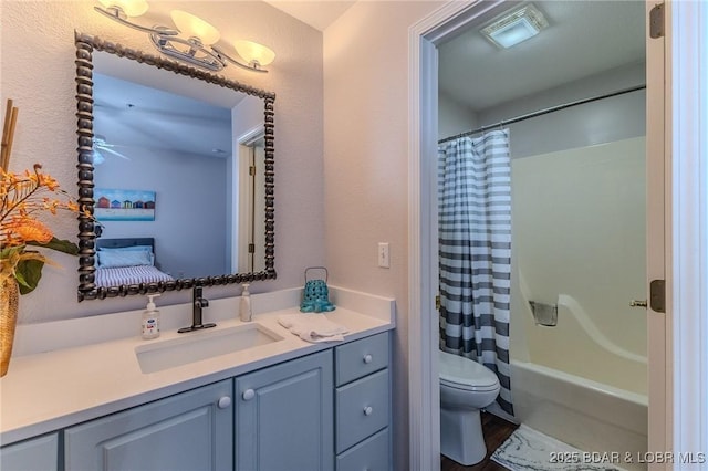906 E Harbour Towne Dr Unit 906E, Lake Ozark, MO 65049 - bathroom with vanity, toilet, shower / bath combination with curtain, and wood finished floors
