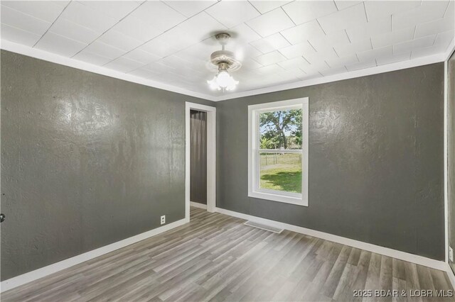 47 Hittridge Rd, Eldon, MO 65026 - empty room featuring wood finished floors, baseboards, and a ceiling fan
