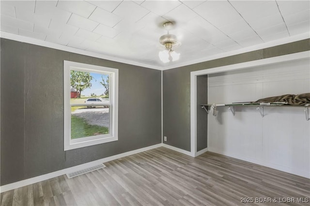 47 Hittridge Rd, Eldon, MO 65026 - unfurnished bedroom with wood finished floors and baseboards