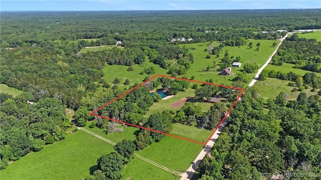 47 Hittridge Rd, Eldon, MO 65026 - aerial overview of property's location featuring a heavily wooded area and property parcel outlined