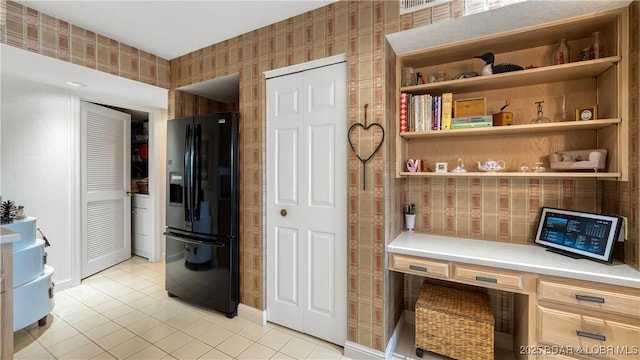 441 Northport Dr Unit 441, Lake Ozark, MO 65049 - kitchen with black fridge with ice dispenser, open shelves, light tile patterned floors, and light countertops