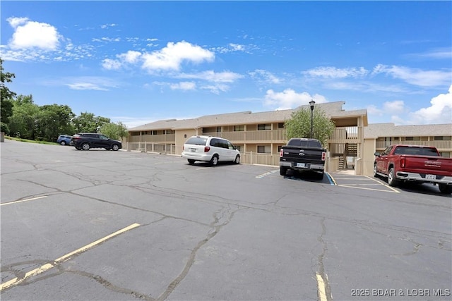 875 Parkside Pl Unit B102, Osage Beach, MO 65065 - view of uncovered parking lot