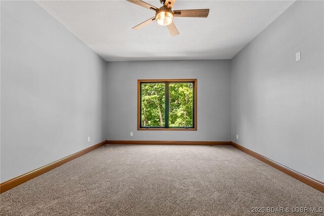55 Turn Bridge Ln, Porto Cima, MO 65079 - unfurnished room featuring carpet, ceiling fan, and baseboards