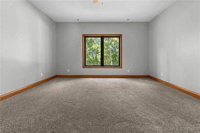 55 Turn Bridge Ln, Porto Cima, MO 65079 - unfurnished room featuring carpet floors and baseboards