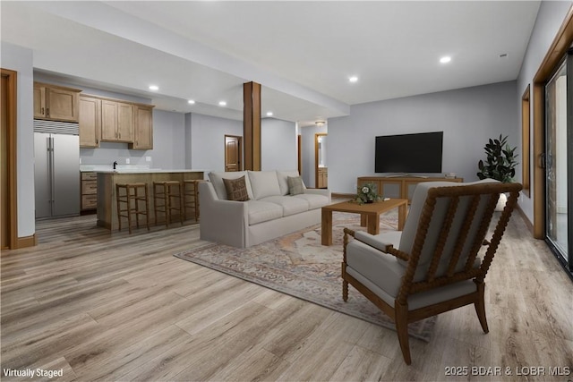 55 Turn Bridge Ln, Porto Cima, MO 65079 - living area with light wood-style floors and recessed lighting